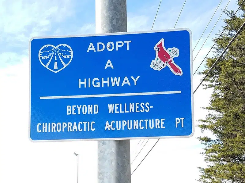 Sign for freeway in Ashburn VA that was adopted by Beyond Wellness, a chiropractic office
