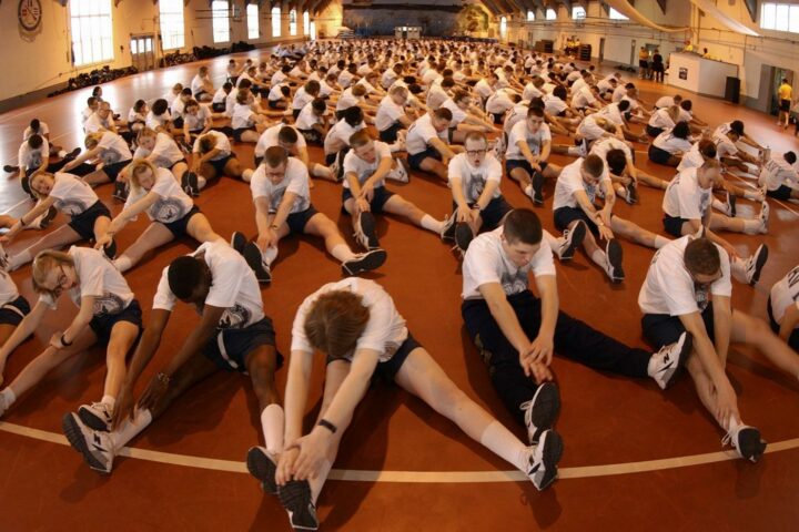 Large group of people stretching before coming to Beyond Wellness, a chiropractic office in Ashburn Virginia