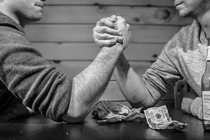 Two people shaking hands at Beyond Wellness, a premier chiropractic office with reiki services in Ashburn VA